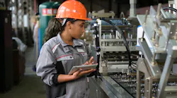 worker-tablet-inspection-machinery