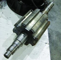 Figure 14. A 75 kW (100 hp), 5,000 rpm maximum, 8 pole SRM rotor. Figure 14. A 75 kW (100 hp), 5,000 rpm maximum, 8 pole SRM rotor.