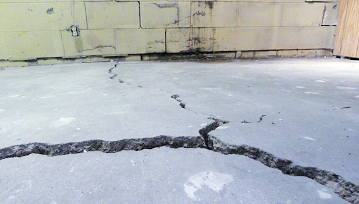 Crumbling concrete flooring under carpet - General Inspection