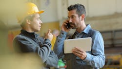 1660318232532 Workerstalkingphonetablet 1660318232532 Workerstalkingphonetablet