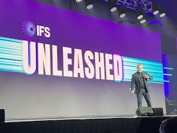 IFS CEO Darren Roos kicks off the event by encouraging plants to break down data silos among EAM, ERP, FSM, and ESM systems.