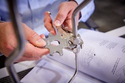 Figure 2. To ensure tube fittings are tightened enough, technicians should employ a gap inspection tool and adjust accordingly. Figure 2. To ensure tube fittings are tightened enough, technicians should employ a gap inspection tool and adjust accordingly.