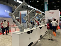 The humans at the IMTS show outnumbered the robots and cobots, but not by much! The humans at the IMTS show outnumbered the robots and cobots, but not by much!