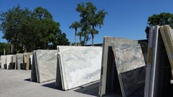 Workers injured after being struck by three stone slabs, manufacturer to pay £12K Workers injured after being struck by three stone slabs, manufacturer to pay £12K