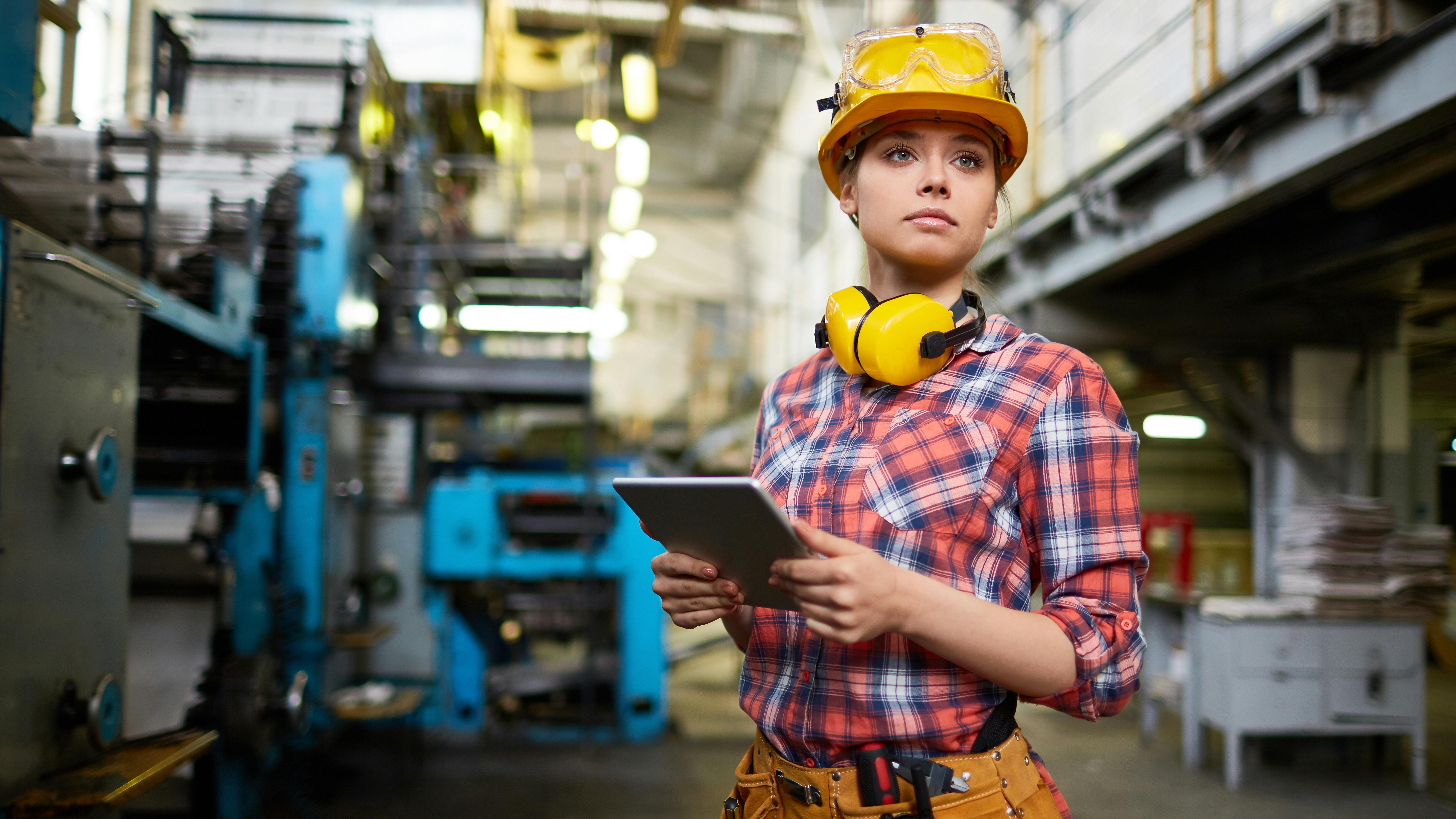 68960fb8044ef2b3909a4c3b Adobestock 111789024woman In Ppe Holding Tablet In