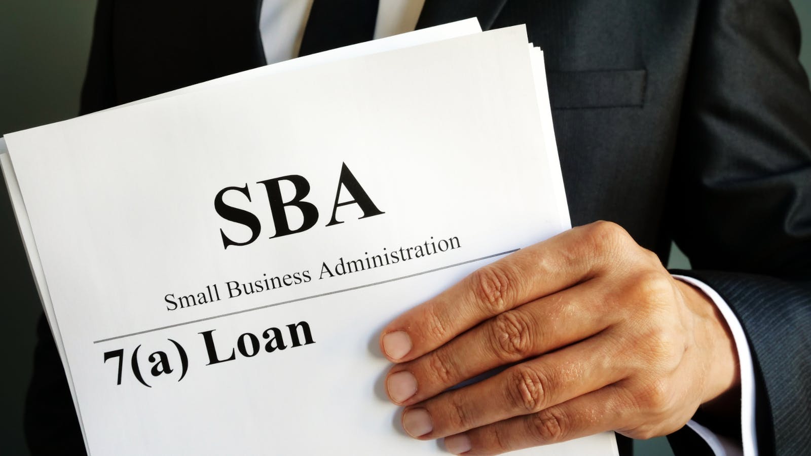 Paperwork with the header: 'SBA Small Business Administration 7(a) loan'
