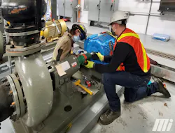 Figure 1. Technicians install and perform an alignment for a new premium efficiency motor, selected for energy savings on a pumping application. (Courtesy of Motion Repair & Services) Figure 1. Technicians install and perform an alignment for a new premium efficiency motor, selected for energy savings on a pumping application. (Courtesy of Motion Repair & Services)