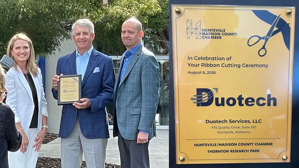 Jami Peyton, chair of the Huntsville/Madison County Chamber and CEO of Canvas, presents a commemorative plaque to Brian Ferraioli of Bernhard Capital Partners and Dan Bader, president and CEO of Duotech Services, during Duotech&rsquo;s August 6 ribbon-cutting ceremony in Huntsville, Alabama.