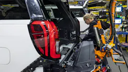 An employee at a Ford plant in Kentucky works on an Expedition SUV. Image credit: Ford