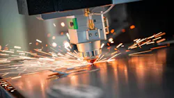 A CNC laser machine cutting steel